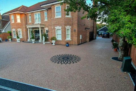 Resin driveway under construction, showcasing the base layer preparation.
